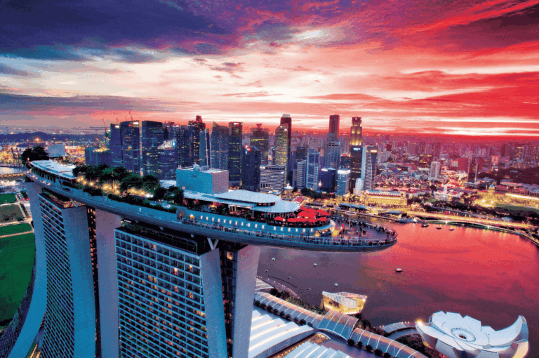 A breathtaking sunset aerial of Marina Bay Sands with lush greenery on its sky park, overlooking the Singapore skyline and Marina Bay, capturing the vibrant city life and stunning views that inspire Singapore al fresco dining and alfresco dining experiences. The scene evokes rooftop bars, best rooftop bars, and biophilic dining experience settings perfect for corporate events, private events, or a special occasion with loved ones, friends, and guests. Nearby attractions like Open Farm Community, Canopy Changi Village, Botanic Gardens, Bishan Park, Sentosa Island, Mount Faber Peak, Coastal Settlement, Bee’s Knees, and Alkaff Mansion offer outdoor seating, garden wing charm, and nature escapes. Ideal venue choices range from Waterfall Ristorante Italiano at the Shangri La Hotel and Shangri La’s restaurant spaces to Duxton Hill dining, serving western classics, burgers, pizzas, and Italy‑inspired cuisine. Menus served for breakfast, brunch, lunch, dinner, or a meal with kids meals for little ones and furry friends. Signature cocktails, fresh dishes, and casual bites complemented by panoramic views, sunrise, sunset, and night lights make it the perfect venue to soak, explore, discover, and indulge. From raffles place to island escapes, town favorites to farm retreats, every table promises to delight taste buds and celebrate life, with opening hours to suit adults and fun seekers alike, offering a range of indoor and outdoor options.