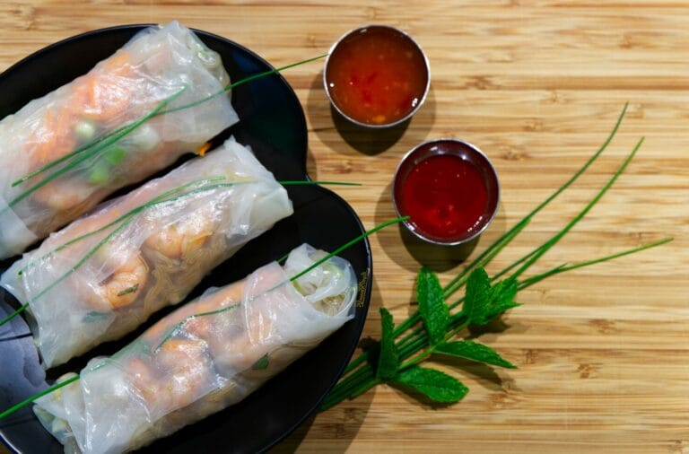 Vietnamese Cuisine in SG: Colorful spread of spring rolls, noodles, and dipping sauces