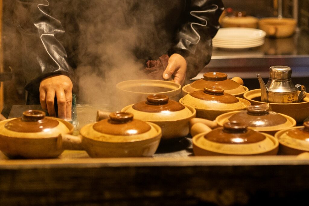 Peranakan Cuisine in Singapore : Traditional claypot methods create complex flavours and textures in Peranakan cooking.