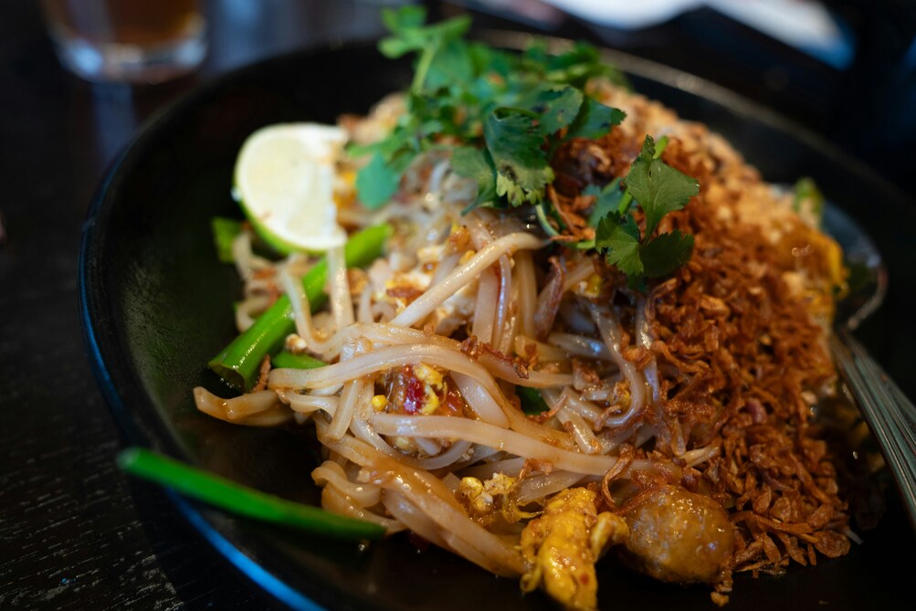 Thai Cuisine in Singapore : Classic Pad Thai with stir-fried noodles, peanuts, and tamarind sauce