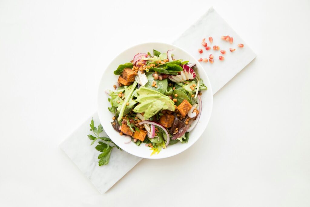 American Food SG: Fresh salad showcasing wellness-focused American dining in Singapore