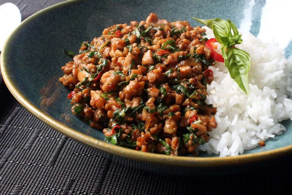 Thai Cuisine in Singapore : Classic pad kra pao gai with tender chicken and aromatic holy basil