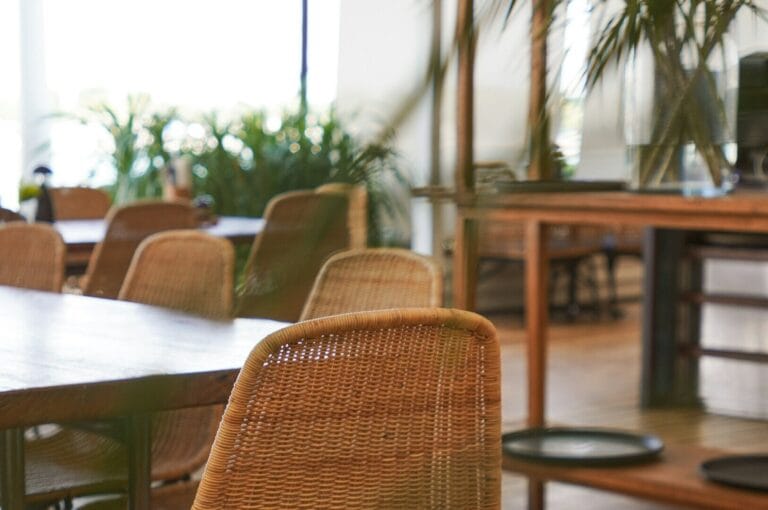 A table surrounded by chairs, located in Singapore's most exceptional restaurant.