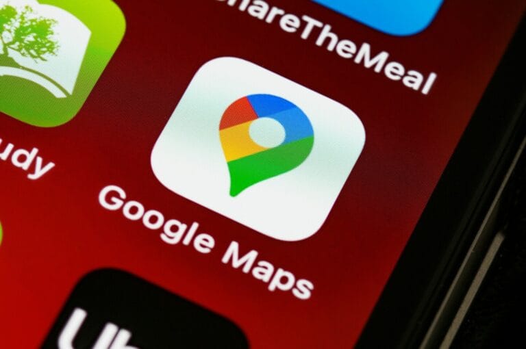 Smartphone featuring the Google Maps app interface, highlighting a map and location details.