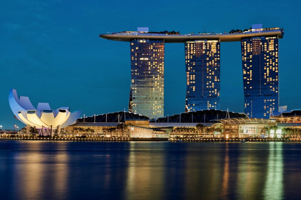 Aerial view of Marina Bay Sands hotel and casino in Singapore, highlighting its unique design and dining options.