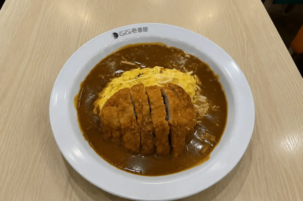 Pork cutlet curry rice with omelette at CoCo Ichibanya Bugis+