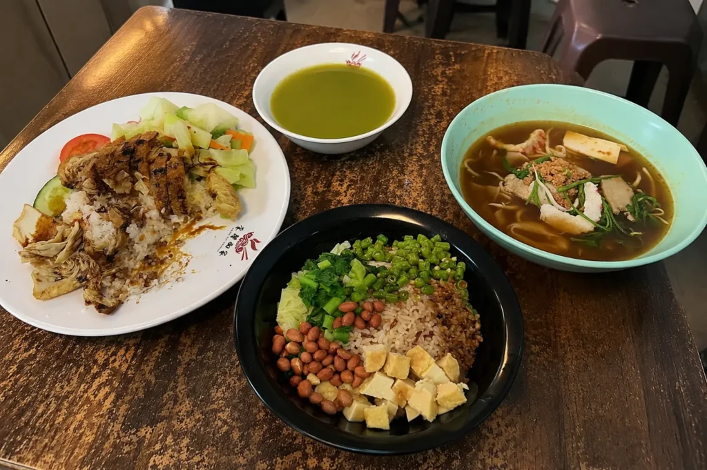 Thunder Tea Rice, vegetarian chicken rice, noodle soup, and green soup at Pine Tree Cafe.
