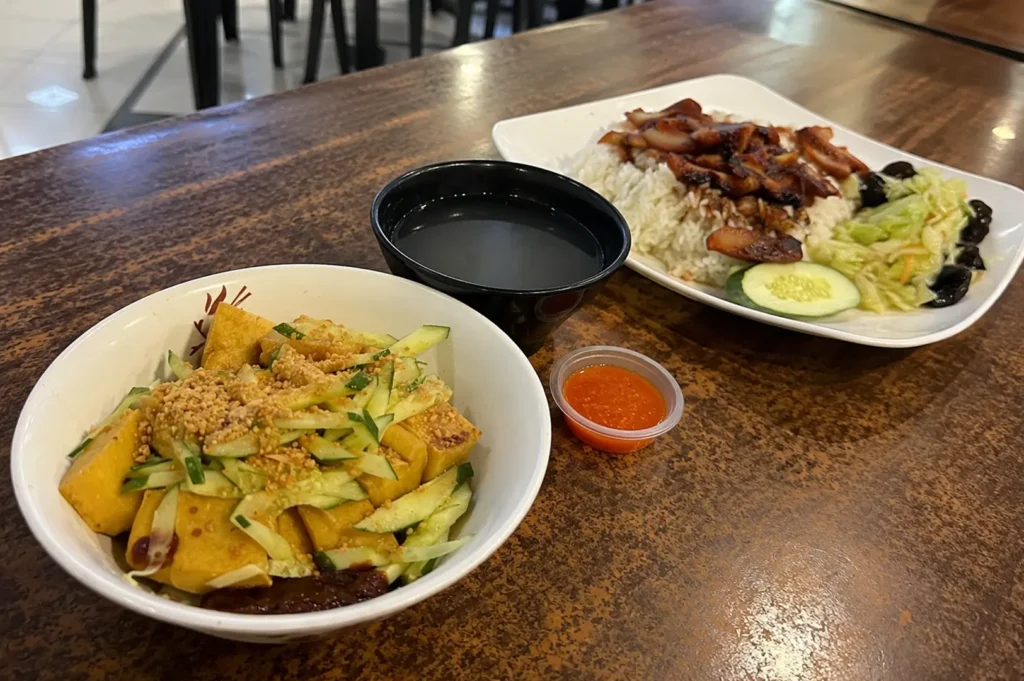 Vegetarian tofu bowl and mock char siu rice with soup at Pine Tree Cafe.